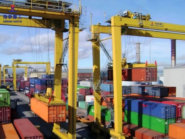 Haitai RTG crane stacking containers in railway intermodal yard