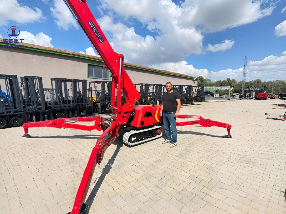 Haitai 0.5 ton SPT299 spider crane lifting a load at a customer site in Turkey, 2020