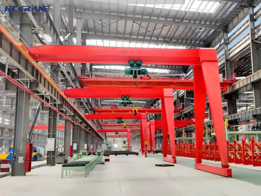 Semi-gantry cranes operating inside a steel fabrication workshop, part of Haitai's broader gantry crane product range