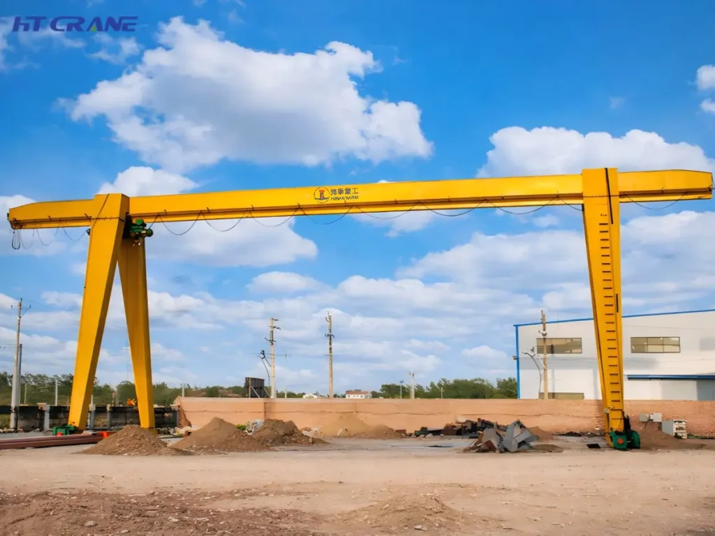 Single girder gantry crane for industrial material handling in an outdoor yard