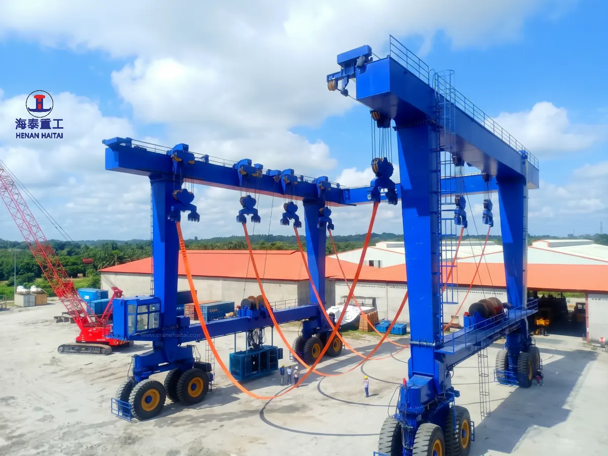 Haitai 500 ton MBH rubber-tyre boat lifting crane exported to Malaysia in July 2020, with lifting slings deployed in an outdoor yard.